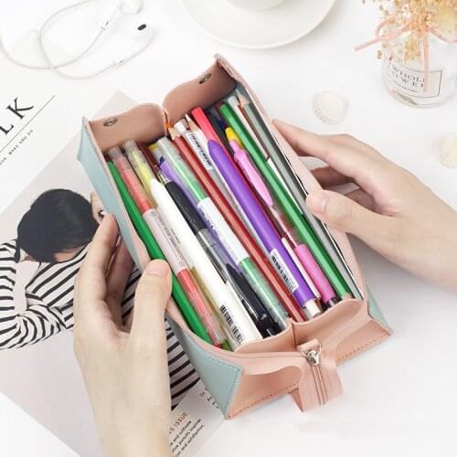 Japan Creative Macaron Stationery Pencil-case Simple Cute Little Monster Zipper Bag leather Men And Women Zipper Pencil Bag