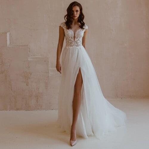 Elegant Side Slit Tulle Lace Wedding Dresses Sexy V-Neck Appliques Cap Sleeve Backless Sweep Train White Bridal Gowns