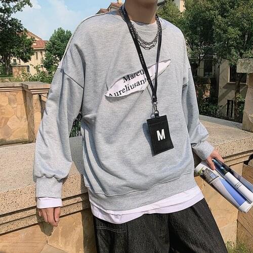 Mens sweater spring hole stitching fake two-piece pullover sweater mens trend loose Japanese casual all-match handsome shirt