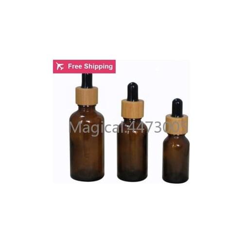 Free Shipping High Quality 10pcs/lot 10ml-100ml Essential Oil Bottles with Natural Bamboo Cover (black)