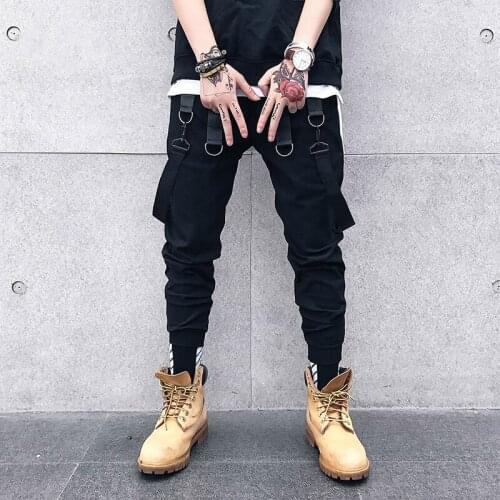 Los hombres de moda la pantalones casuales cinta empalme pantalones Harem hombre Hip Hop pantalones Jogger pantalones de