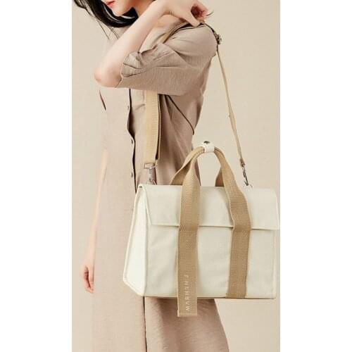 New leisure large capacity hand b/L shoulder cross-body multi-purpose computer bag