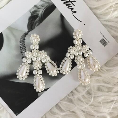 High-end pearl braided earrings