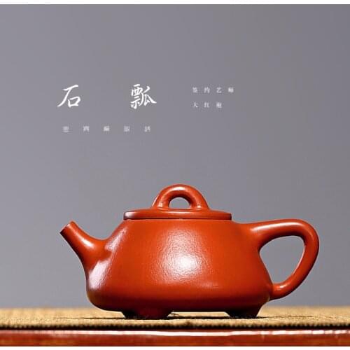 Dahongpao purple sand single hand small stone ladle teapot wholesale sketch engraved tea set manufacturer a substitute