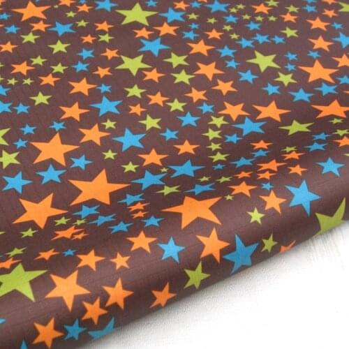 WF222 - PVC coated waterproof fabric - Colorful stars on Deep Brown