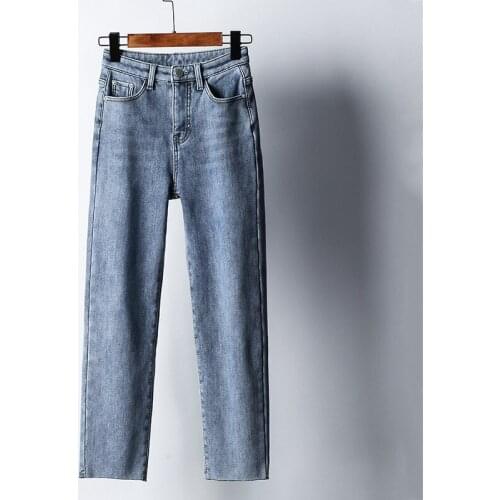 Jeans womens new high-waisted slim-fit all-match thickened raw edge and cashmere fashion solid color straight-leg pants