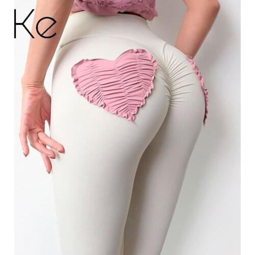 KE Super elastic love pockets nude peach hip yoga pants womens hip high waist running sports fitness pants outer wear
