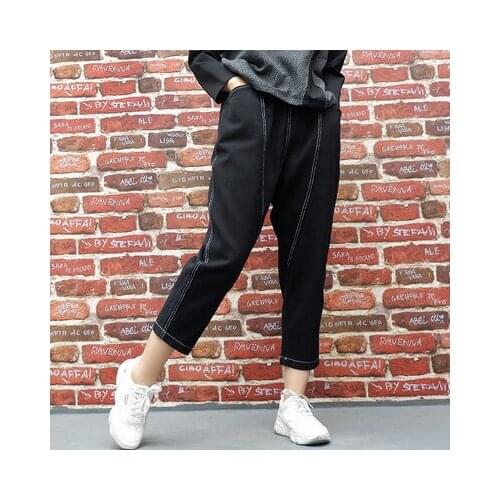 Europe and the United States large casual irregular nine-point trousers early autumn new elastic waist jeans women