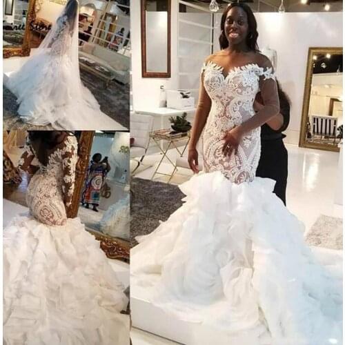 Mermaid Lace Wedding Dresses African Dubai Long Plus Size Bridal Gowns Illusion Long Sleeves Court Train Wedding Wear vestidos