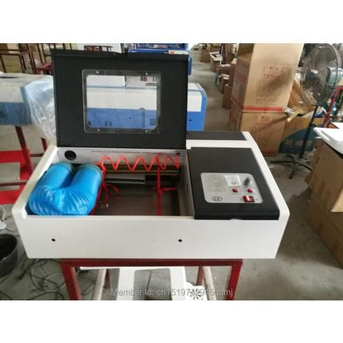 3020 co2 laser engraving machines laser cutting machines for rexine plywood , acrylic , rubber stamp , cloth felt