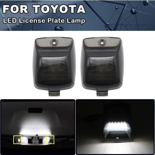 2Pcs White LED License Number Plate Light Lamps For Toyota Tacoma 2005-2015 Tundra 2000-2013 Smoked Lens Car Accessories