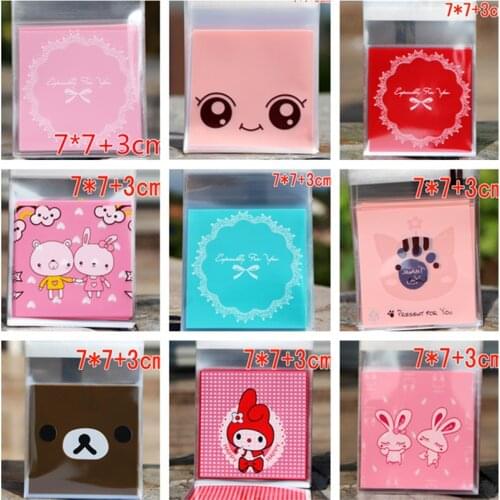 50pcs 7*7cm Christmas Cartoon Candy Bags Self-adhesive Plastic Cookie Bag Xmas New Year Snack Package Gift Bags Kids Favors