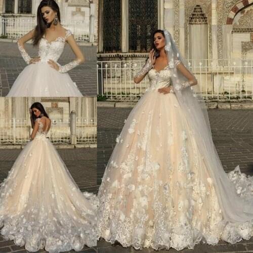 Gorgeous Lace Appliques A Line Wedding Dresses Sheer Long Sleeve Beaded Cathedral Train Bridal Gowns Button Back Custom Made