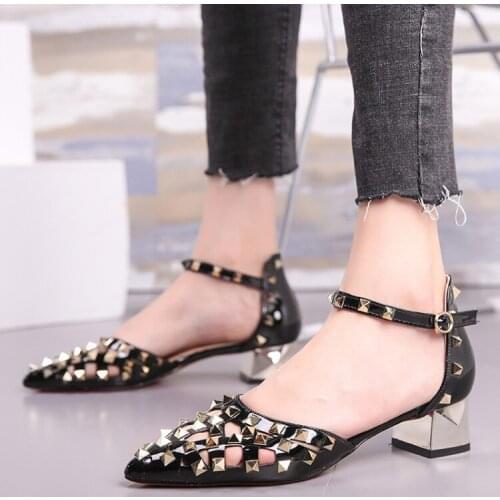 Rivet sandals 2021 summer new European and American pointed toe hollow heels temperament solid color flat-shaped thick heels