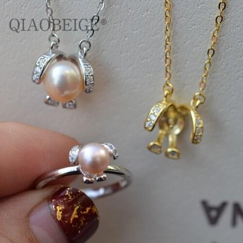 QIAOBEIGE New Handmade diy accessories S925 sterling silver dog shaped small pearl ring with pearl accessories