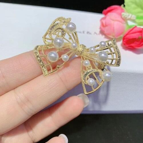 Korean version of natural pearl brooch small fresh multi-bead bow pearl brooch pin micro-paved zircon Bridal Gift