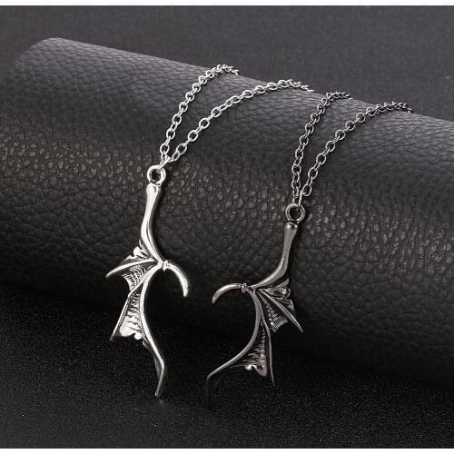 A pair of Heart-shaped Dragon Wings Vintage Pendant Necklace Charm Punk Lovers Necklace Vintage Mysterious Charm For Man Women