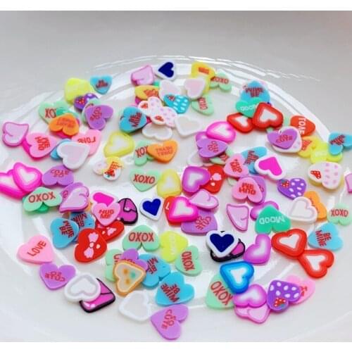 400 beautifully blended heart-shaped flat-back nail decorations decorate a DIY scrapbook with soft pottery craft