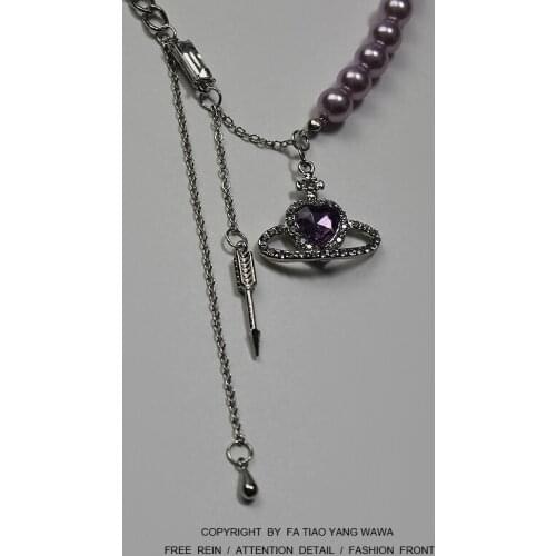 Saturn cosmic arrow necklace