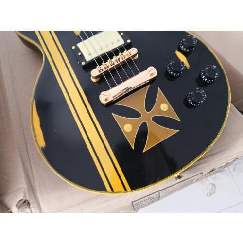 Custom custom 6 string black guitar,yellow binding,HH pickups,black switch,gold bridge,cross pattern body