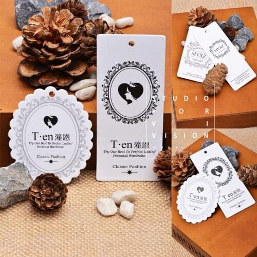 500pcs/lot custom printed fashion hangtag/clothing hang tag/customized die cut uv gold dilver foil hang tags for clothing/bags