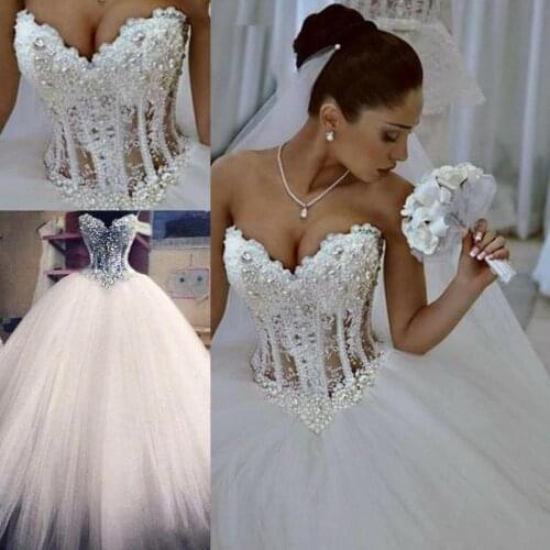 Ball Gown Wedding Dresses Sweetheart Corset See Through Floor Length Princess Bridal Gowns Beaded Lace Pearls Custom Made