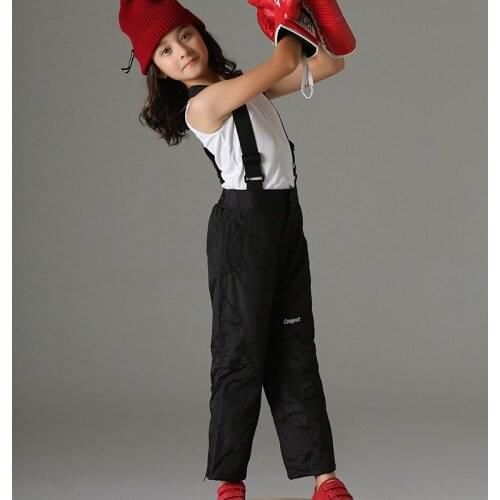 Girl outdoors warm and plush pants windproof and breathable suspenders climbing ski pants