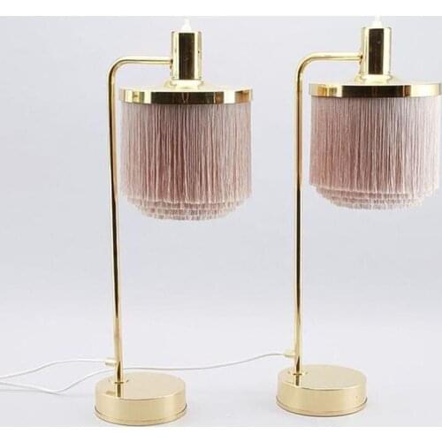 Nordic postmodern desk lamp bedroom bedside living room dining room model art creative warm tassel new