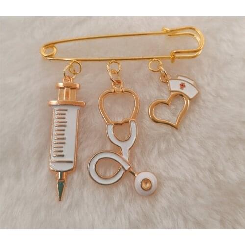Men and women use golden enamel syringe stethoscope brooch hospital clinic professional uniform brooch pin team gift
