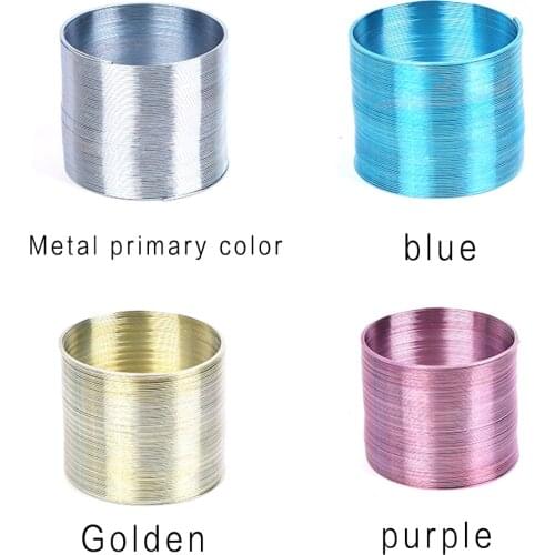 FINEWE Flat Metal Rainbow Circle Funny Classic Wave Ring Spring Toys Multi Color Size 48x58mm With Custom Logo Service