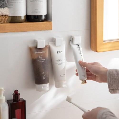 Bathroom Hanging Clip Punch Free Wall Mounted Rack Facial Cleanser Skin Care Products Toothpaste Plastic Storage Shelf