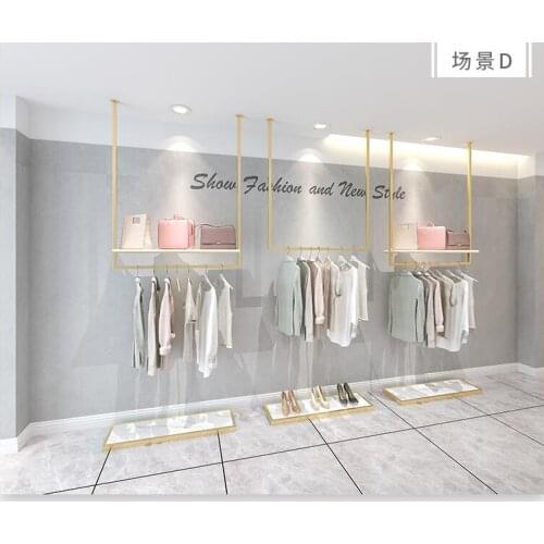 Clothes store clothes rack display rack womens dress wedding dress shelf ceiling hanging clothes rack gold on the wall