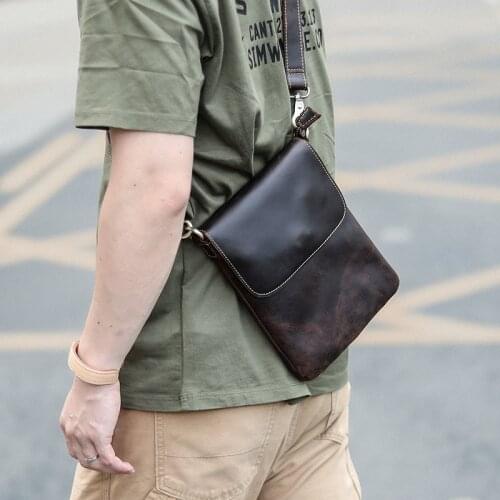 Fashion handmade highquality real leather mens small shoulder bag retro simple mini casual small backpack vertical shoulder bag