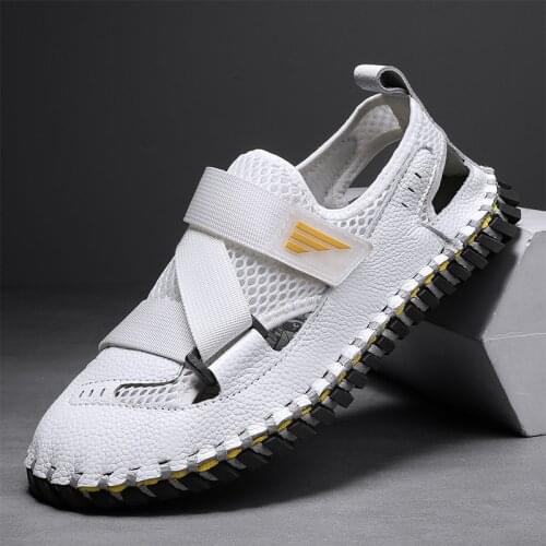 Sandals mens shoes Baotou leisure cool shoes mens leather hollow mens sandals and slippers in summer 2021