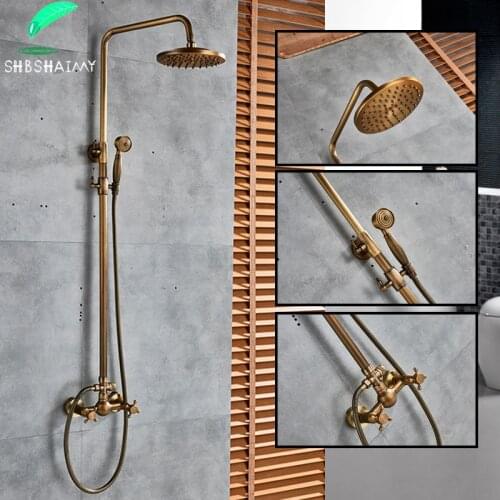 SHBSHAIMY Antique Brass Bathroom Shower Set Wall Mounted rainfall Shower Faucet with Hand shower and Shelf Hot Cold Mixer Tap