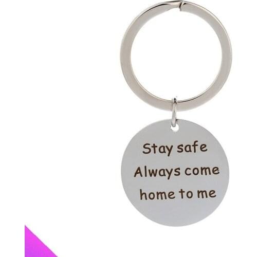 The keychain stainless steel disc pendant is engraved with "stay safe always come home to me" women and men daily necessities