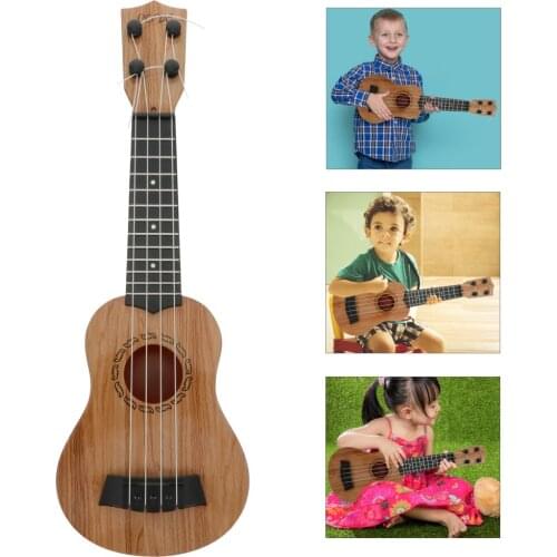 Hot Sale Childrens Toy Ukulele Guitar Musical Instrument Suitable For 4 Strings Wood Ukulele Ukulele for Beginners and Children