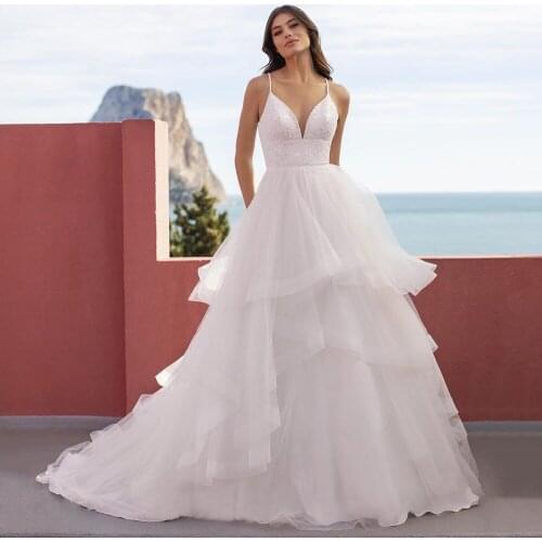Modest V-Neck Tulle A-Line Wedding Dresses 2021 Fashion Spaghetti Straps Sweep Train Button Back Tiered Bridal Gowns Plus Size