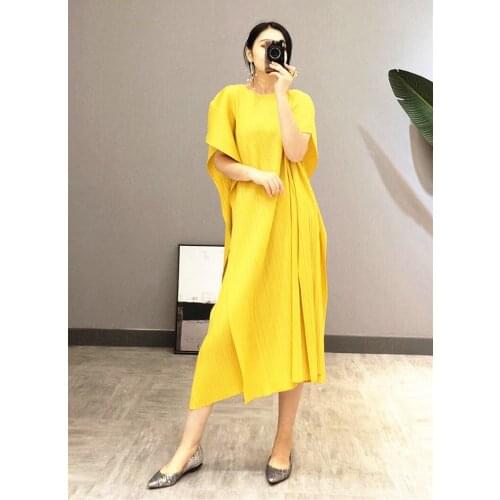 HOT SELLING The dress fashion o-neck short sleeve solid asymmetrical LOOSE dresses IN STOCK
