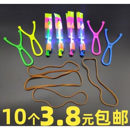 Luminous catapult flying arrow bamboo dragonfly catapult flash flying sword night market source pull string flying saucer