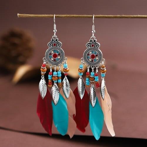 New Womens Bohemian Earrings Feather Wooden Creative Flower Carved Silver Color Alloy Dripping Oil Long Tassel Earrings