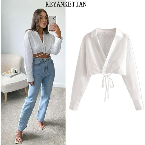 KEYANKETIAN 2021 new style V-neck bow tie double-breasted pure white short shirt ladies sexy crop top