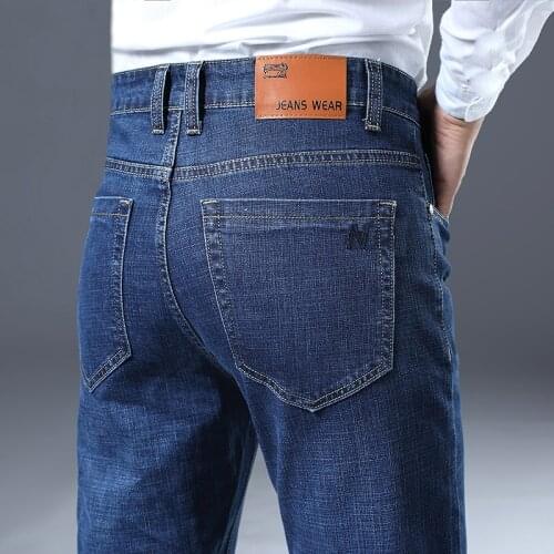 High Quality Spring Autumn Elasticity Jeans Men Straight-Cut Loose Business Casual Pants Youth MENS Trousers Plus-sized 29-46