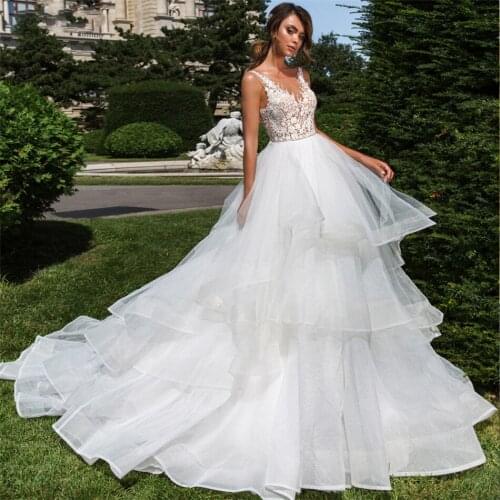 Sheer Lace Appliques A-Line Wedding Dresses Sexy V-Shape Back Tiered Long Bridal Gowns 2020 Formal Sleeveless Wedding Wear