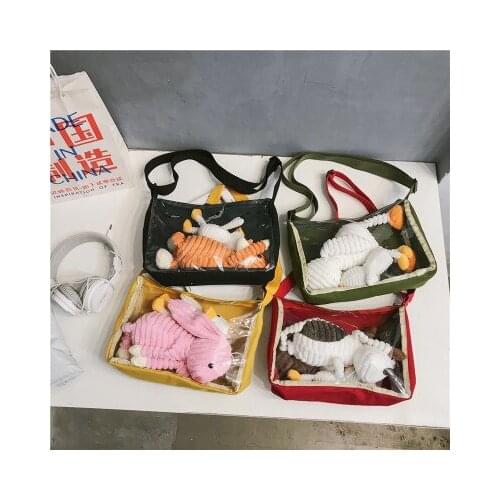 2020 Japan and South Koreas new pu transparent baby bag shoulder messenger bag simple wild two yuan girl animation ita bag