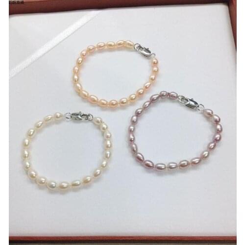 New fashion Exquisite natural fresh water rice shape pearl 6-7mm rice shaped pearl Tibetan silver clasp bracelet