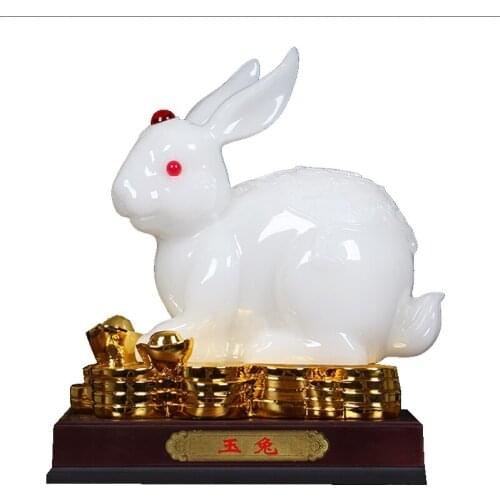 WHITE RABBIT THE MYTHICAL WILD ANI IN PLUTUS ACCUMULATE THE MYTHICAL WILD ANIMAL JADE MEDALLION ANDTHE MASCOT OF GOOD LUCK