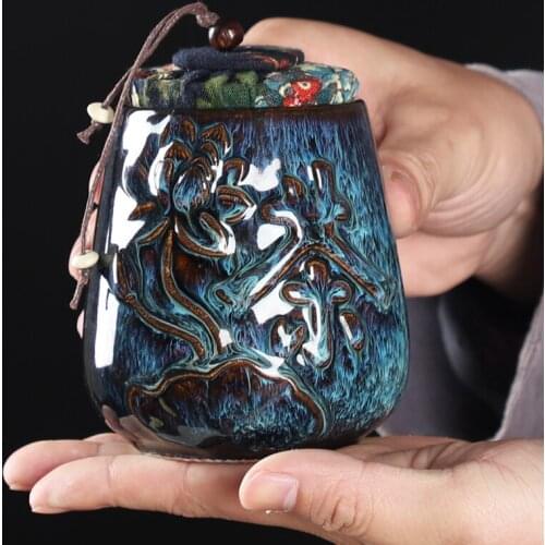 Chinese Style Kiln Ceramic Tea Caddy Mini Portable Sealed Storage Jar Embossed Flower Candy Jar Kitchen Storage Container Decor