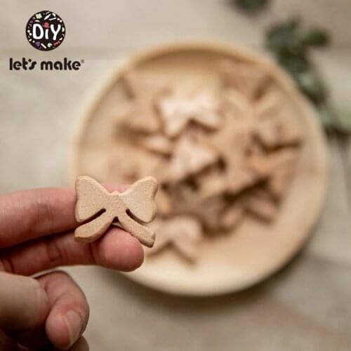 LetS Make 100pc Wooden Teething Bead Beech Wooden Bow Beads BPA Free Wooden Teethers Toys Wooden Teether Baby Teether