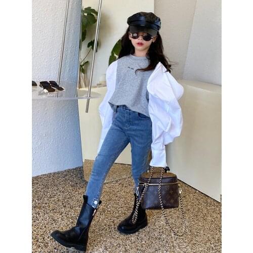 Baby girl button design jeans 2021 autumn new childrens Korean version of the high waist all-match slim fit pants for kids